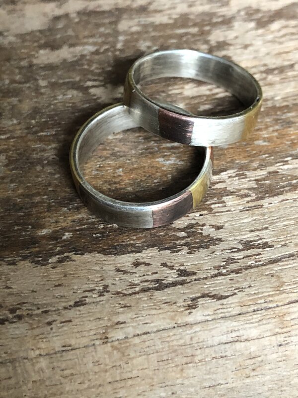 Marriage of metal 'Theirs" rings