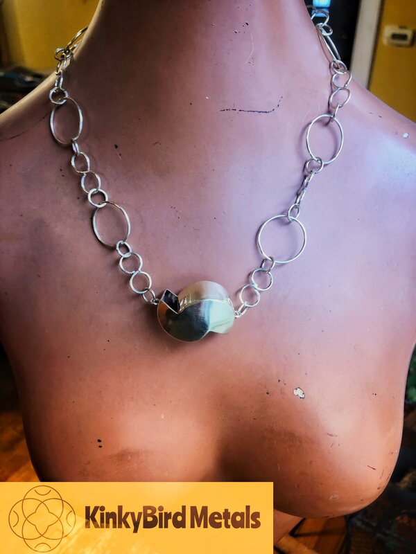 Brass free-form hand constructed pendant