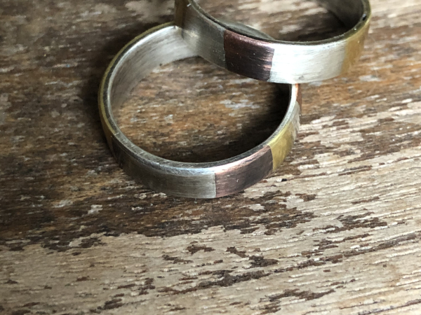 Marriage of metal 'Theirs" rings