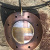 Reverse view of moon side of copper mixed metal pendant