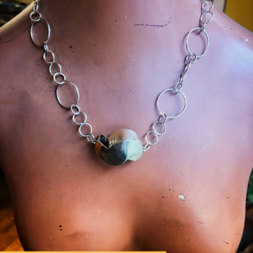 Brass free-form hand constructed pendant