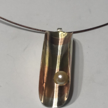 Marriage of Metal Pendant with Pearl